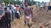 Assam: Rising Brahmaputra threatens embankment in Lakhimpur, authorities deploy geo-bags Assam: Rising Brahmaputra threatens embankment in Lakhimpur, authorities deploy geo-bags