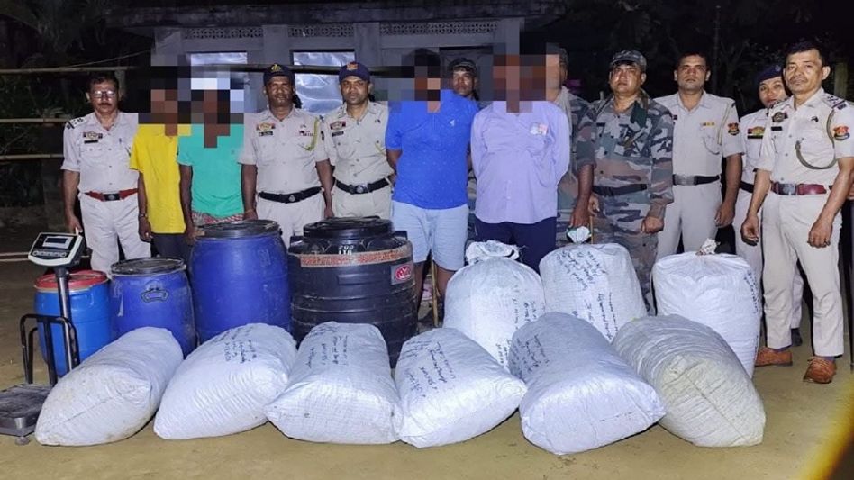 Father-son duo arrested after 122 kg cannabis found buried beneath house floor in Tripura Father-son duo arrested after 122 kg cannabis found buried beneath house floor in Tripura