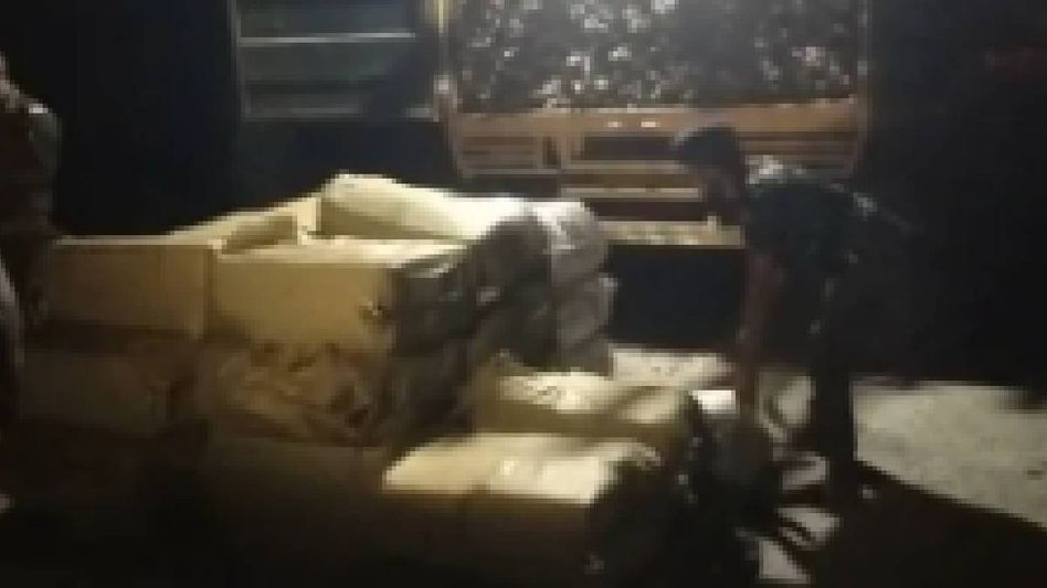 Assam police seize 18500 packets of foreign cigarettes hidden inside container truck in Kokrajhar Assam police seize 18500 packets of foreign cigarettes hidden inside container truck in Kokrajhar