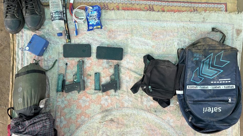 Two pistols, ammunition seized from jhum field in Assam's Dima Hasao, one person held Two pistols, ammunition seized from jhum field in Assam's Dima Hasao, one person held