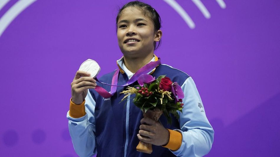Manipur's Roshibina Devi wins silver despite flu; mother says, 'Even then, she participated' Manipur's Roshibina Devi wins silver despite flu; mother says, 'Even then, she participated'