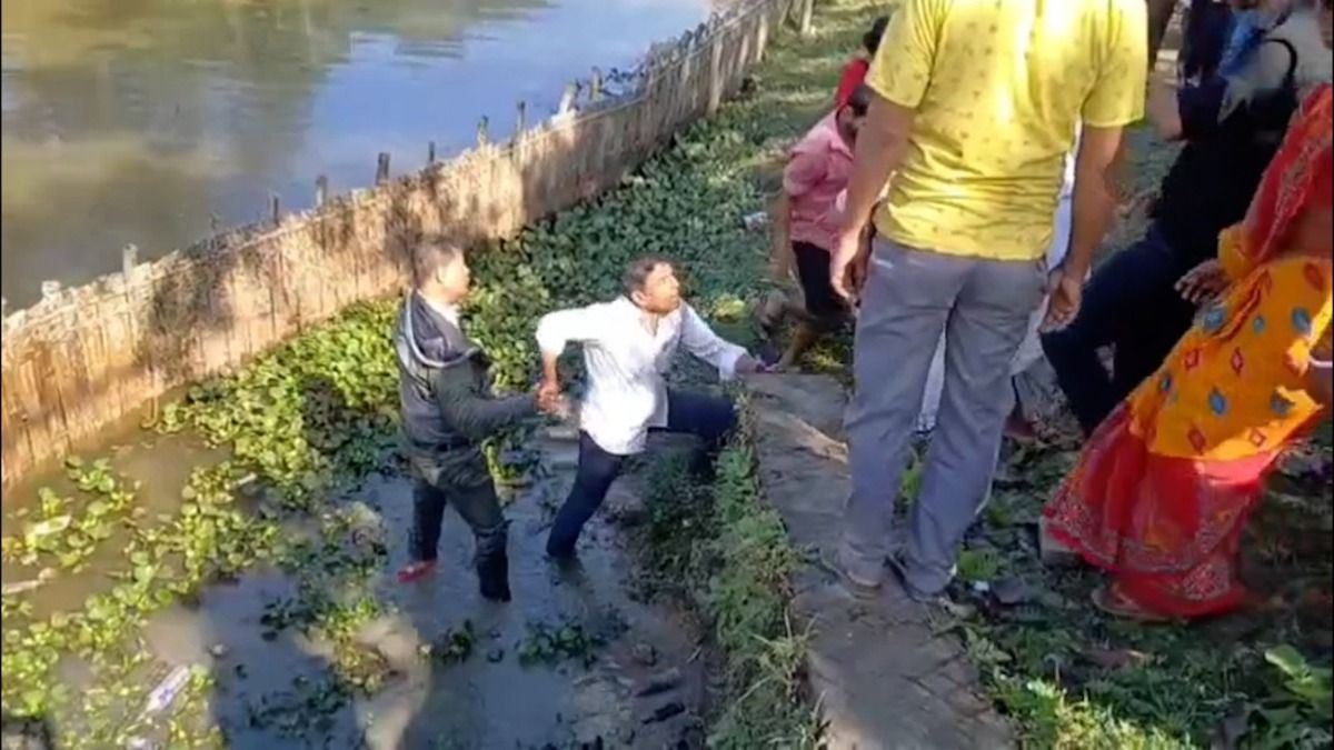 Sribhumi panchayat secretary jumps into drain to escape angry locals