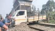 Goods vehicle hit by train at railway crossing in Assam's Tinsukia Goods vehicle hit by train at railway crossing in Assam's Tinsukia