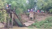 Footbridge collapses in Cachar’s Borkhola, villagers jump into river to save themselves Footbridge collapses in Cachar’s Borkhola, villagers jump into river to save themselves