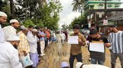 Assam: Frustrated by poor roads, Sribhumi youths launch public donation drive to repair damaged highway Assam: Frustrated by poor roads, Sribhumi youths launch public donation drive to repair damaged highway