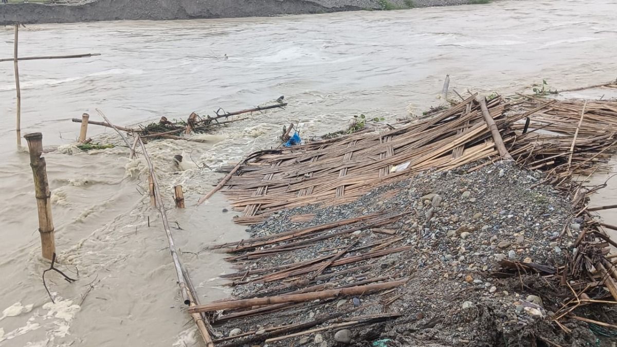 Assam: Chirang residents forced to use boats after floodwaters wash away only bamboo bridge
