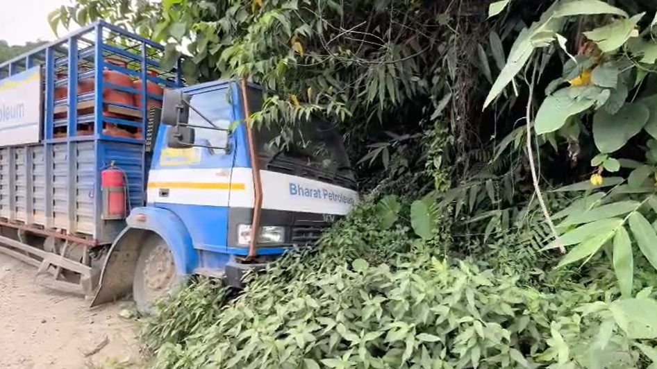 Truck carrying LPG cylinders crashes after wheel comes off on Assam's Silchar-Haflong highway