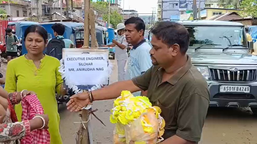 Residents stage symbolic 'tribute' to executive engineer over dilapidated Assam's Silchar Medical road