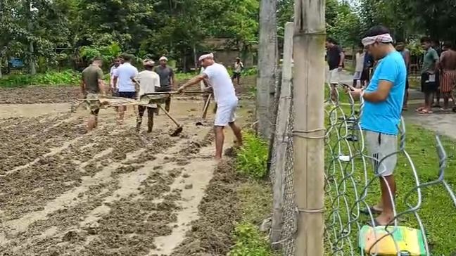Adivasi students' body AATASU launches paddy sowing drive for flood-hit farmers in Assam's Sivasagar