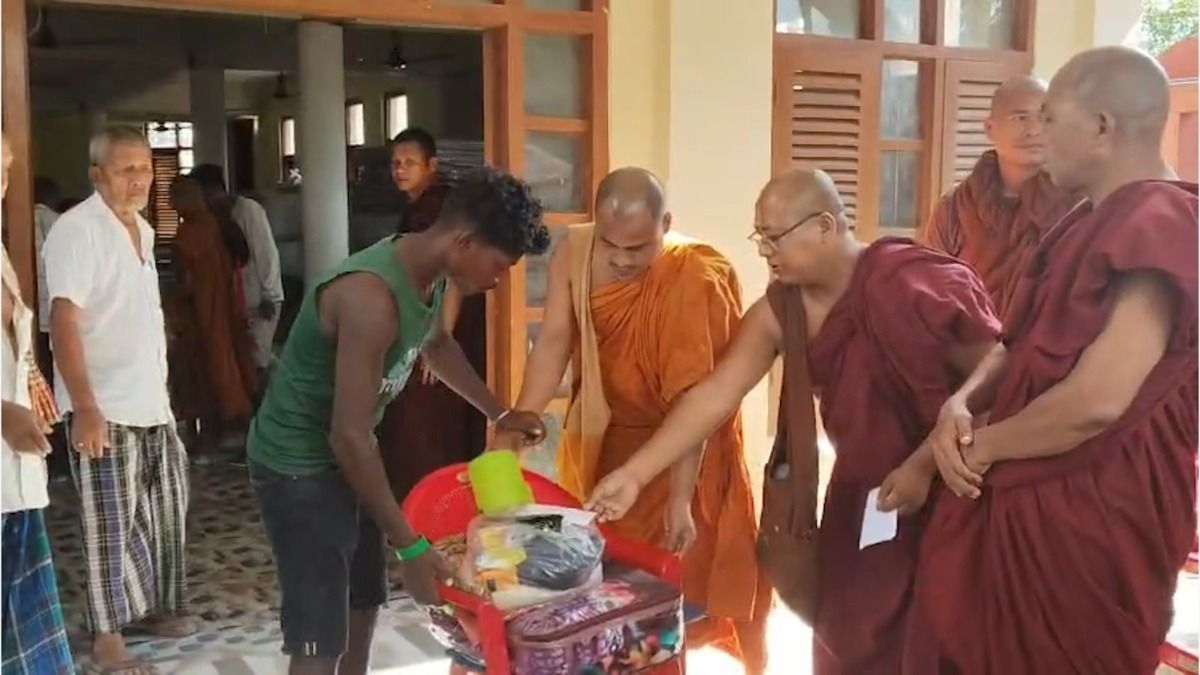 Buddhist monks from Arunachal distribute relief materials in flood-hit Sivasagar, Charaideo