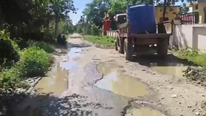 Assam: Tinsukia residents seek urgent repair of pothole-ridden road ahead of Durga Puja
