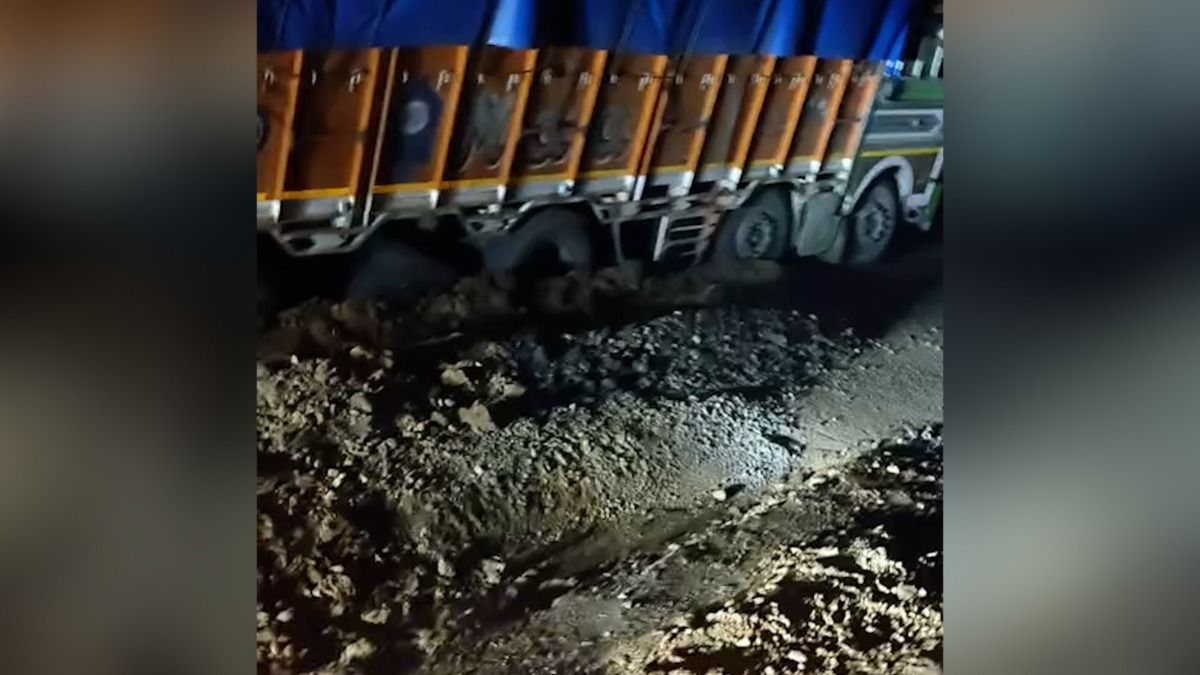 Assam: Loaded truck gets stuck in pothole on NH-27 in Dima Hasao