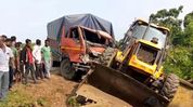 Truck, JCB plunge into pond after collision on NH-36 in Assam’s Nagaon; two drivers injured Truck, JCB plunge into pond after collision on NH-36 in Assam’s Nagaon; two drivers injured
