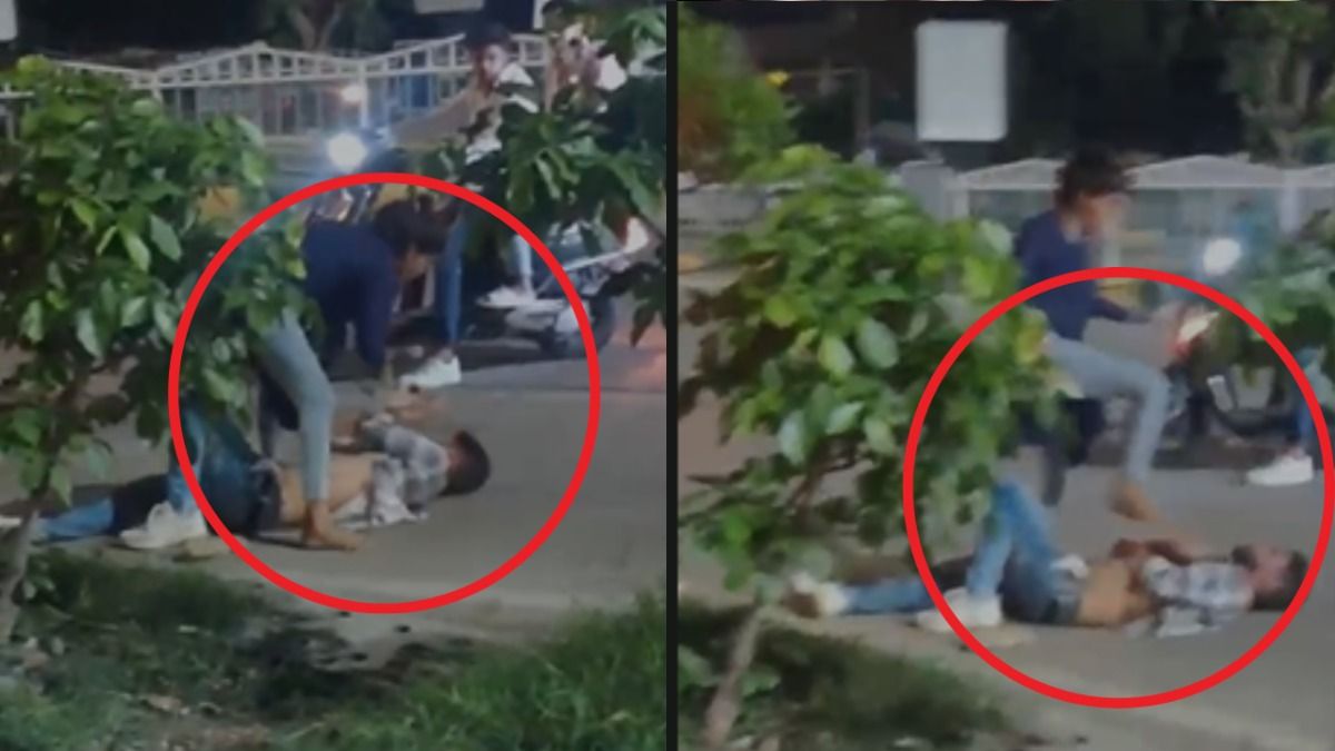 इंदौर वायरल वीडियो में युवती बीच सड़क पर युवक को पीटती हुई