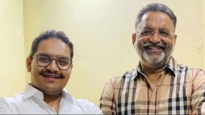 Umar Ansari (L) with his late father Mukhtar Ansari. 
