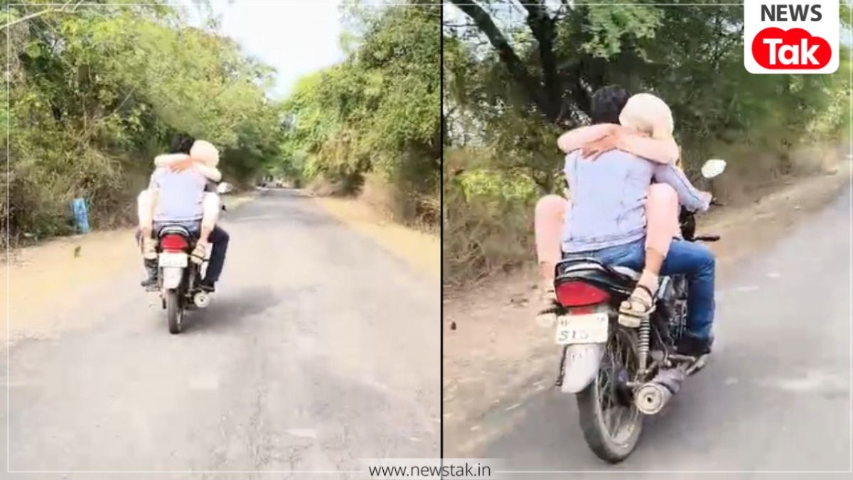 MP में प्रेमी जोड़े का जानलेवा स्टंट, चलती बाइक पर पेट्रोल टैंक पर बैठकर प्रेमिका ने डाली बाहें, वीडियो आया सामने Sagar bike stunt video