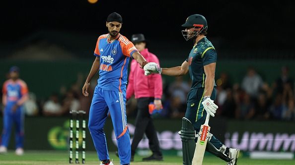 Marcus Stoinis of Australia is acknowledged by Arshdeep Singh