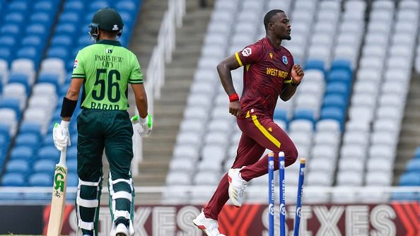 Jayden Seales (R) of West Indies celebrates the dismissal of Babar Azam