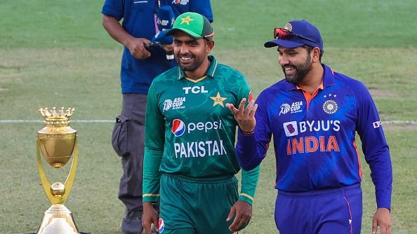 India's captain Rohit Sharma (R) and Pakistan's captain Babar Azam