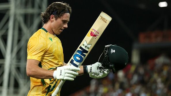 Dewald Brevis of South Africa raises his bat as he leaves the ground on 125 not out during game two in the T20 International