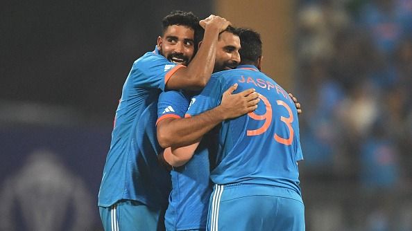 Mohammed Siraj (L), Mohammed Shami and Jasprit Bumrah (R)