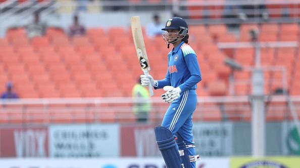 Smriti Mandhana of India celebrates after scoring a fiftyduring game one of the Women's ODI series between India and Australia