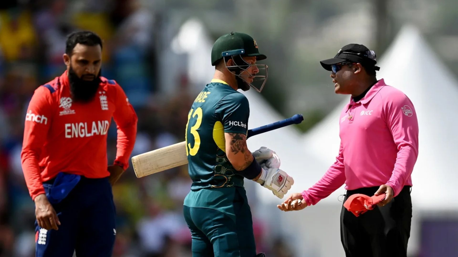 T20 World Cup: भारतीय अंपायर से भिड़ा ऑस्ट्रेलियाई खिलाड़ी, आईसीसी ने लगाई फटकार पर नहीं काटे पैसे