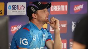 England's captain Jos Buttler looks dejected as he sits in the team dugout England's captain Jos Buttler looks dejected as he sits in the team dugout