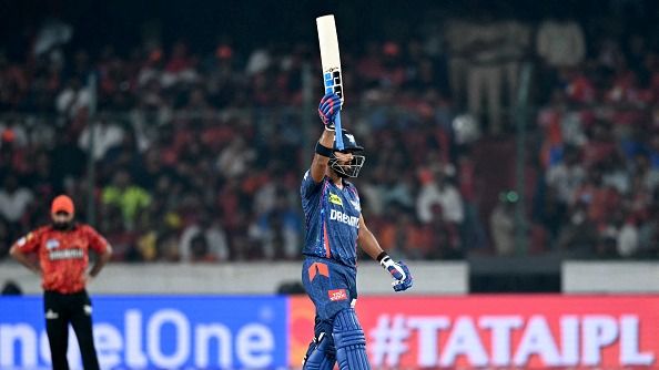 Lucknow Super Giants' Nicholas Pooran celebrates after scoring a half-century