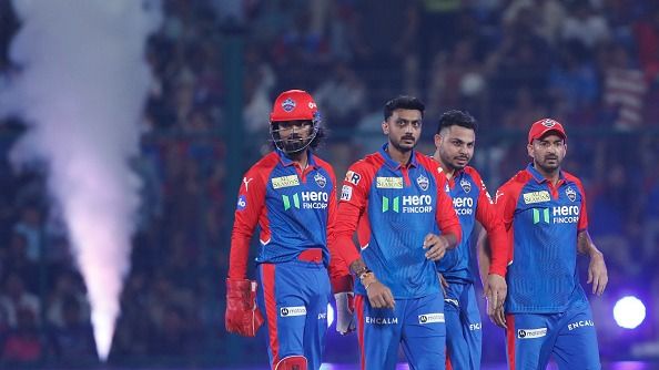 Axar Patel of Delhi Capitals celebrates after taking the wicket of Riyan Parag