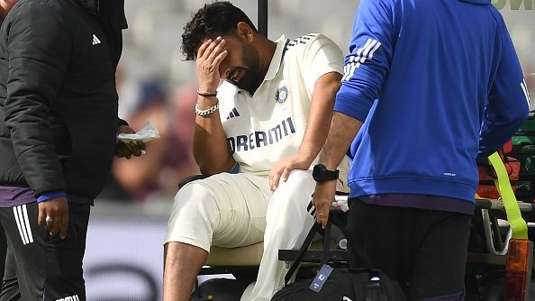 Rishabh Pant of India leaves the field on an ambulance vehicle during the first day of the 4th Rothesay Test match between England and India