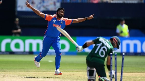 Jasprit Bumrah of India celebrates taking the wicket of Mohammad Rizwan