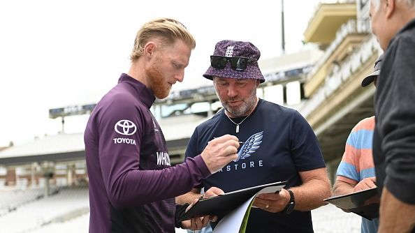 Ben Stokes of England signs an autograph