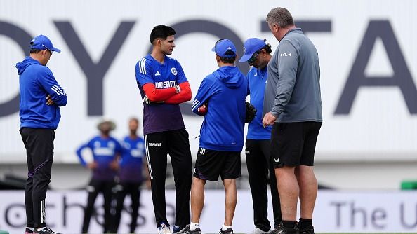 India head coach Gautam Gambhir (centre) faces away from Oval head groundsman Lee Fortis