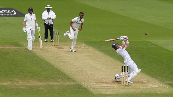 Ollie Pope of England swings at a Prasidh Krishna delivery
