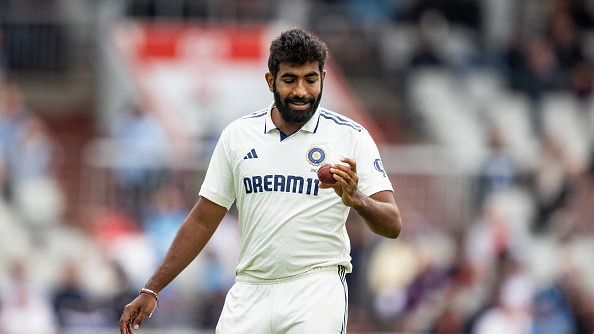  Jasprit Bumrah of India inspects the ball during day four of the 4th Rothesay Test Match between England and India at Emirates Old Trafford on July 26, 2025 in Manchester, England.