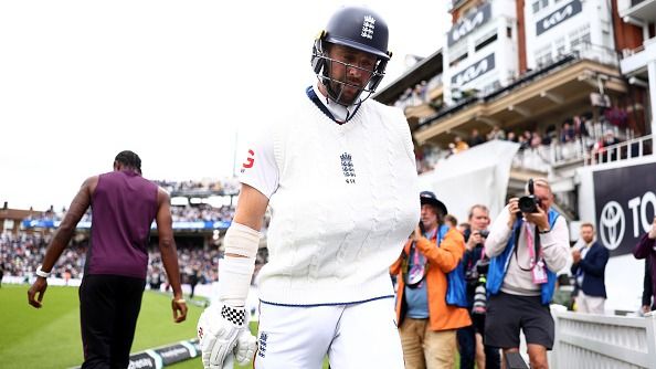 Chris Woakes of England walks off the field