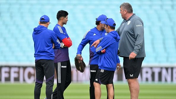 Surrey groundman Lee Fortis speaks with Indian team