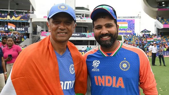 Rahul Dravid (L) and Rohit Sharma pose for a photograph