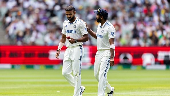 Jasprit Bumrah of India having a chat with Akash Deep