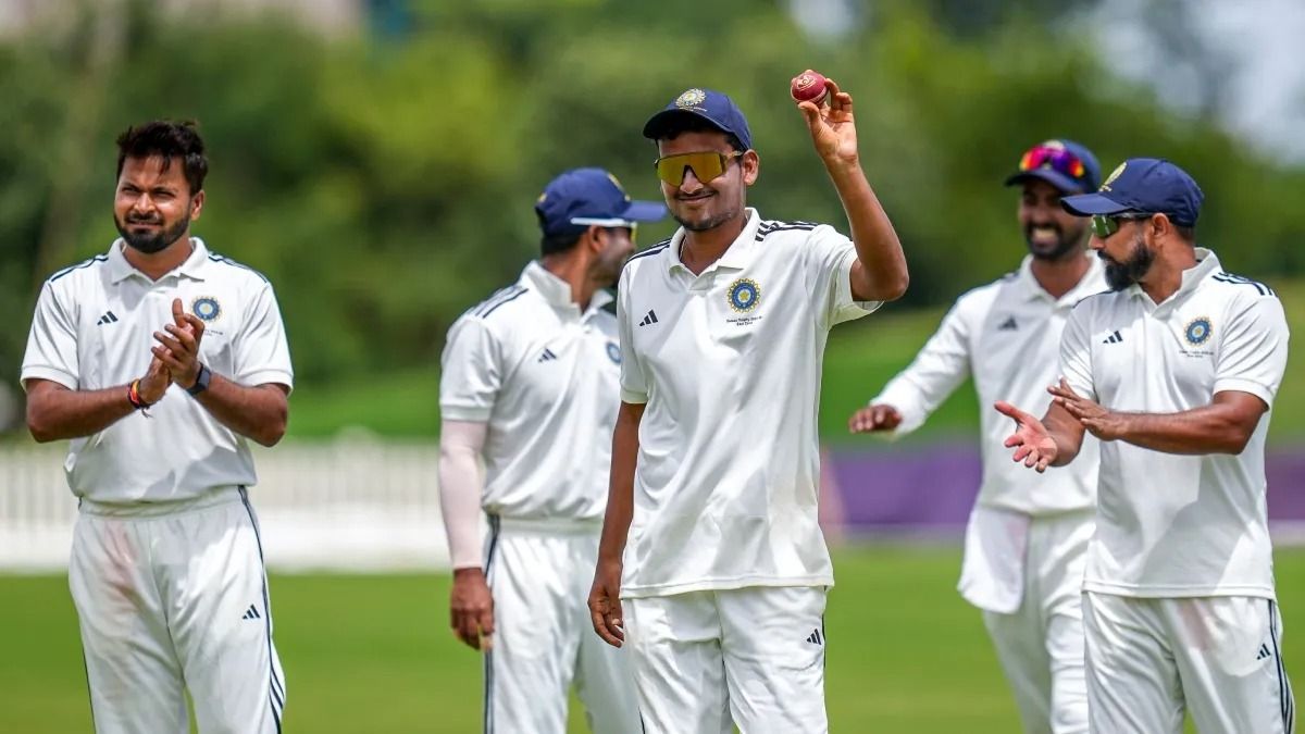 Manishi after taking 6 wickets