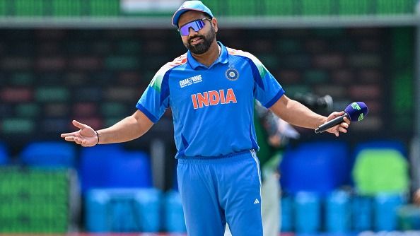 India's captain Rohit Sharma reacts after the toss before the start of the ICC Champions Trophy one-day international (ODI) final cricket match between India and New Zealand 
