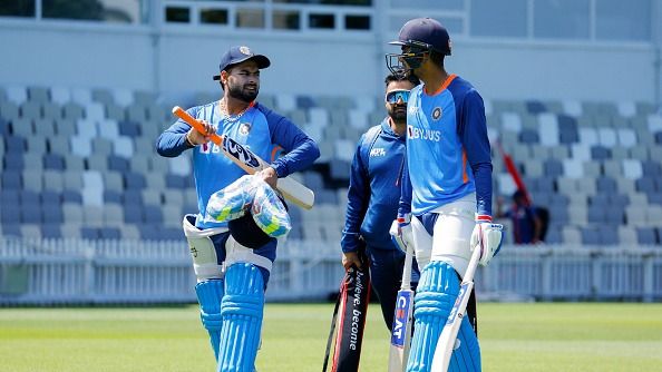 Rishabh Pant (L) and Shubman Gill talk during an India training session
