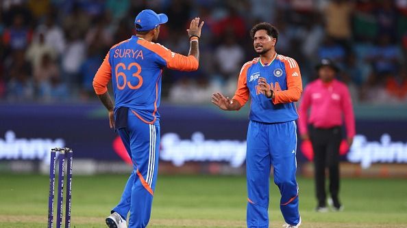 Kuldeep Yadav of India celebrates with Suryakumar Yadav