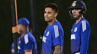 Suryakumar Yadav (C) and Shubman Gill (R)