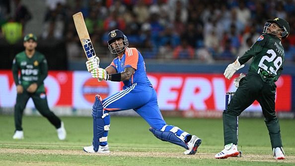 Suryakumar Yadav (C) plays a shot
