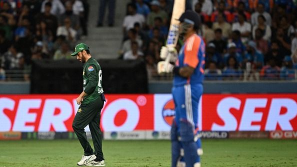 Pakistan's captain Salman Agha (L) and India's captain Suryakumar Yadav