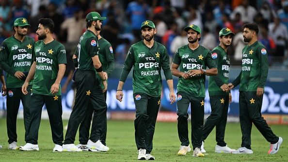 Pakistan's players walk back to the pavilion