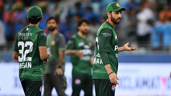 Pakistan's captain Salman Agha (R) reacts at the end of the Asia Cup 2025 Twenty20 international cricket match against India at the Dubai International Stadium in Dubai on September 14, 2025. 