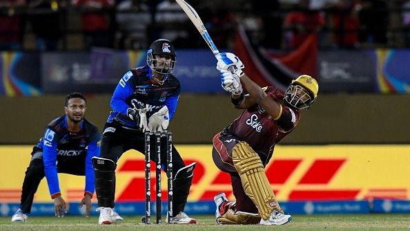 Nicholas Pooran (R) of Trinbago Knight Riders